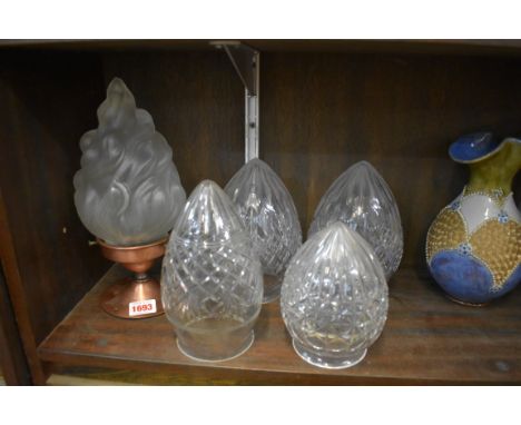 A vintage copper and frosted glass flame lantern,&nbsp;total length 26.5cm; together with a pair of cut clear glass shades; a