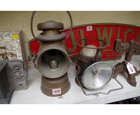 A Lucus 'King of the Road' lamp,&nbsp;no.724; together with another vintage lamp.&nbsp; 