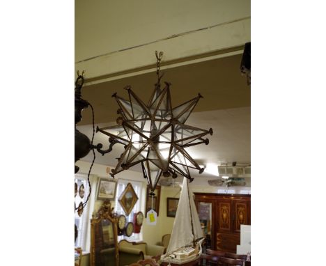 An old brass and glass starburst lantern,&nbsp;40cm diameter.&nbsp; 