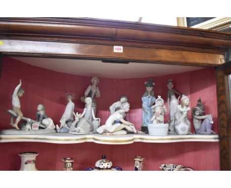 Eleven Lladro figures, (damage to some). 