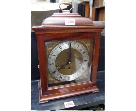 A&nbsp;modern mahogany mantel clock,&nbsp;by Comitti, height including handle 31.5cm. 