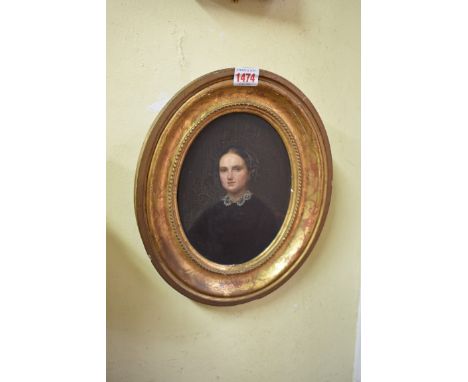 English School, 19th century, bust length portrait of a young lady, oil on board, 21 x 16.5cm oval. 