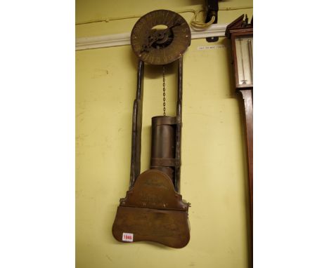 A late Victorian brass water clock,&nbsp;inscribed 'R Holden Fecit, Salisbury, Anno Dom 1690', 76.5cm high.&nbsp; 
