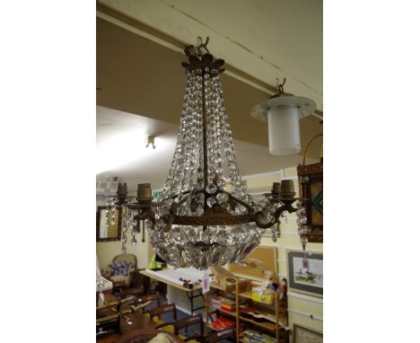 An old brass and faceted glass five branch chandelier,&nbsp;55cm high. 