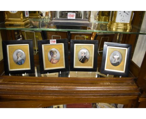 A set of four Continental porcelain portrait miniatures, each 8.2 x 6.4cm oval. 