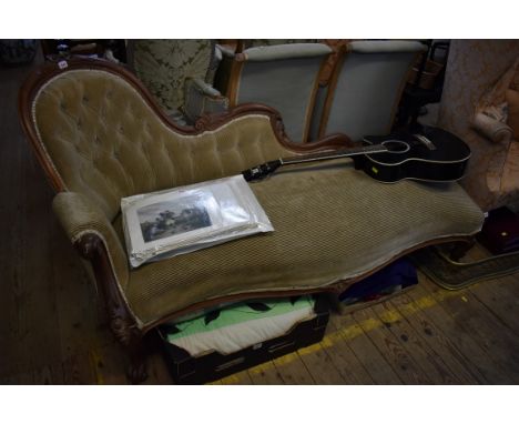 A Victorian carved walnut and button upholstered chaise longue.&nbsp;&nbsp; 