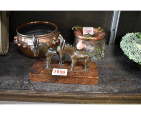 Willi Soukop,&nbsp;a bronze figure group of two donkeys, on walnut socle, signed, 14.5cm wide.&nbsp; 