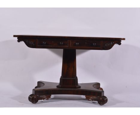 A William IV pedestal sofa table, rectangular top with rounded corners, fitted with two frieze drawers, matched by dummy draw