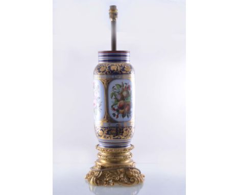 A Second Empire style porcelain and gilt metal lamp base, a vase shape body, painted with reserves of flowers and fruit, cast