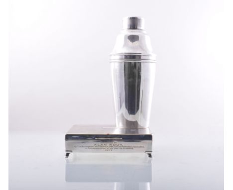 An electroplated cocktail shaker, shouldered form, engine turned band, 24cm and a presentation electroplated cigarette box (2