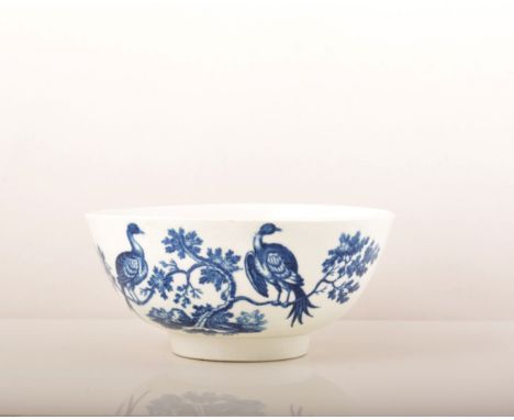 A First Period Worcester blue and white bowl, printed Birds in Branches pattern, circa 1780, the interior decorated with a si