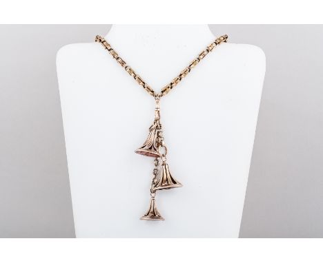 Necklace with three fobs.  A yellow metal ornately cast chain, formed from pairs of rectangular links, 6.5mm gauge, 80cms lon
