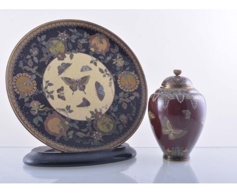 A Japanese cloisonne ovoid vase, four character seal mark, paw free - red ground with stylised pendented flowers and butterfl