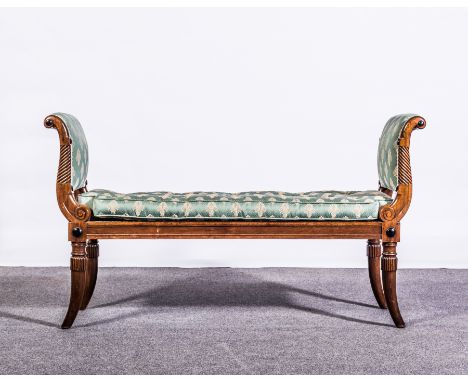 A William IV mahogany window seat, celadon coloured and patterned cotton brocade squab cushion and conforming end panels, scr