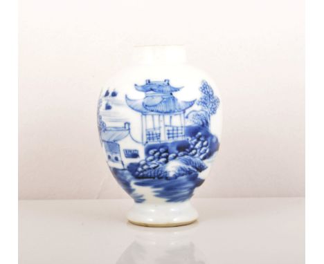 A Chinese blue and white porcelain ovoid tea caddy, Qianlong, decorated with river landscape and pavilions, (lacking lid), 11