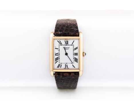 Chopard - A gentleman's 18 carat yellow gold wrist watch having a rectangular arabic numeral dial in a plain polished case wi