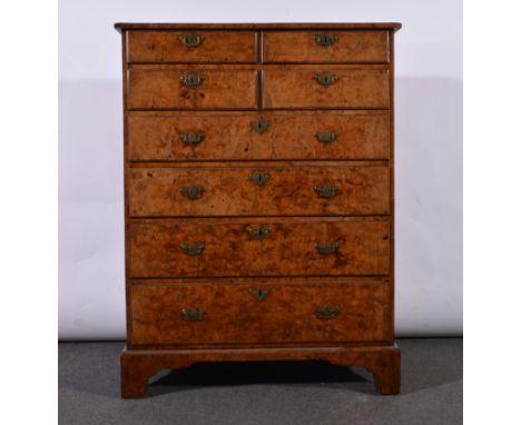A George III style burr elm chest of drawers, the top with broad crossbanding and quartered veneers, fitted with two pairs of