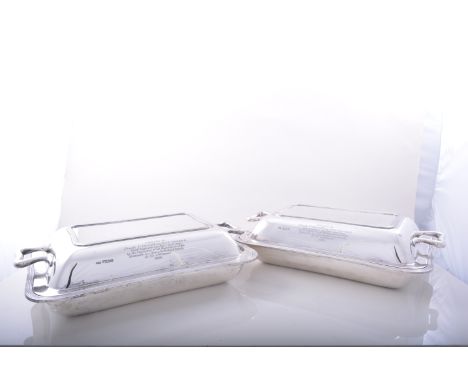 A pair of silver presentation entree dishes, by Atkin Bros, Sheffield 1937, cushion rectangular form with reeded bands, each 