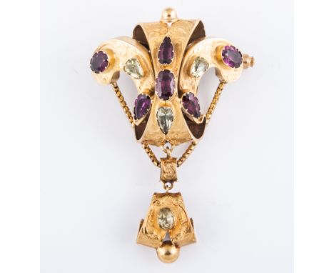 A Victorian yellow metal hollow Fleur-de-Lys design brooch, finely engraved and set with almandine garnets (6), and untested 