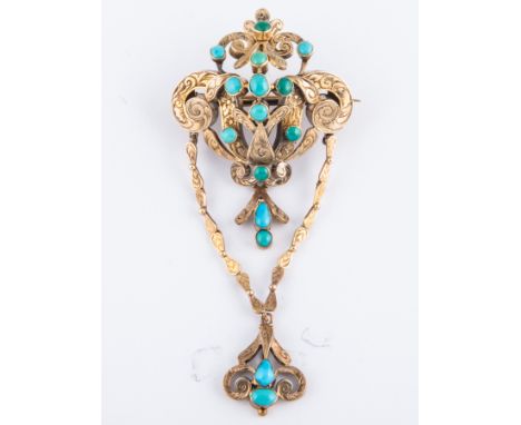 A Victorian yellow metal classical design brooch, set with an oval cabochon cut turquoise in a mount of engraved scrolls. Dro