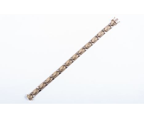 A yellow and white metal bracelet, the 9mm wide flexible construction alternating with polished white metal egg timer shaped 