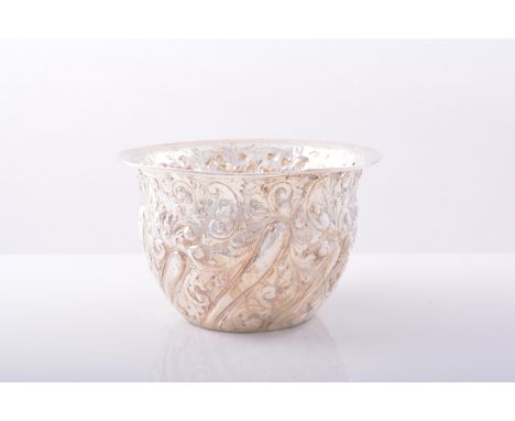 A Victorian silver sugar basin, by Nathan and Hayes, London 1893, semi wrythen moulded, embossed with scrolling foliage, 7cm.
