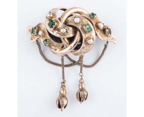 A Victorian yellow metal brooch conversion of etched and plain hollow construction set with pale emeralds (6) and half pearls