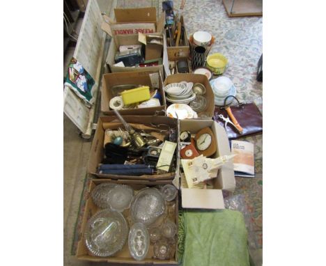 A stillage of mixed items to include china, glassware, kitchenalia, tools, leather bag, clocks, vases etc etc. stillage not i