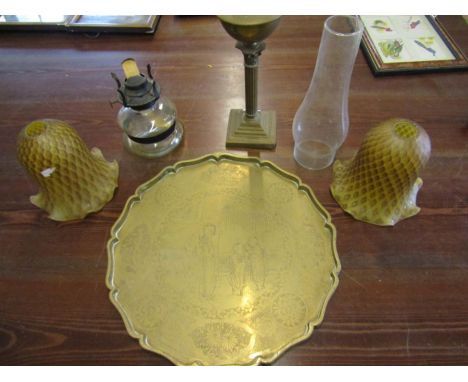A brass tray with etched detail, 2 light shades and oil lamps
