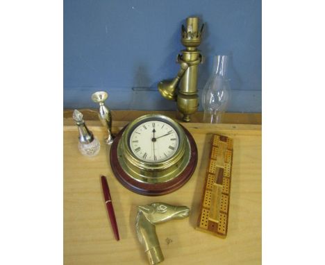 A brass light fitting with glass funnel shade, a brass walking stick head, brass ships clock, crib board, parker pen etc