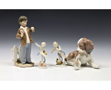 A collection of lladro and Nao figures comprising Lladro puppy with snail - Nao young boy with flowers and watch 1278, togeth