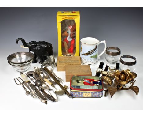 A rummage box of vintage and antique collectables comprising a boxed 'Orinoco Womble' Pelham puppet; ebony elephant figure; v