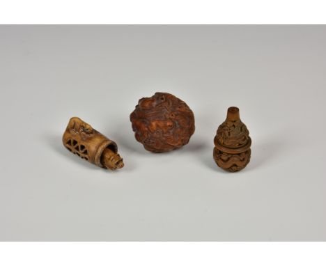 Three 20th century carved Japanese netsuke comprising of a Zodiac animal ball, double gourd with carved dragon and a dog in k