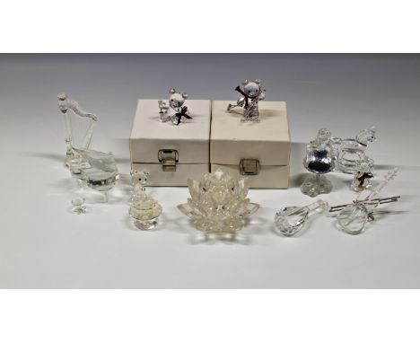 A collection of Swarovski figures to include four Teddy Bears (3 boxed); Little Red Riding Hood; Rocking Horse; Piano; Harp; 