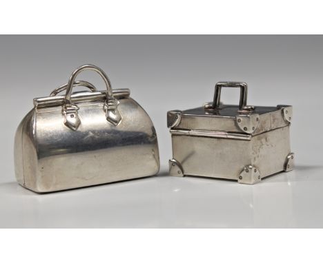 A modern novelty silver trinket box Links of London, 1998, fashioned as a steamer trunk, 1 3/8in. (3.5cm.) wide, together wit