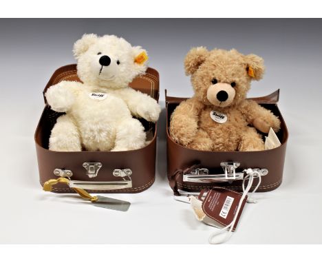 Steiff Fynn and Lotte teddy bears both contained in the original suitcase, Fynn in buff mohair, EAN111471; Lotte with blonde 
