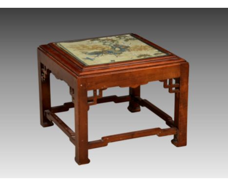 An Oriental stained beechwood glass top occasional table second half 20th century, the top with painted silk panel beneath de