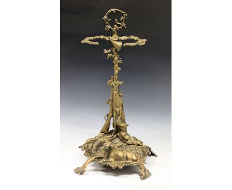 A Victorian style cast metal hunting theme stick/umbrella stand 22in. (56cm.) high.