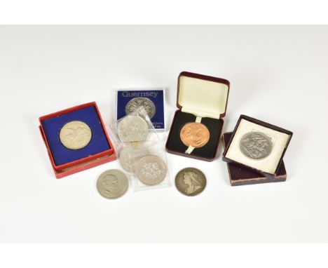 A cased 1935 George V silver crown, together with a cased 1951 Festival of Britain silver crown; a Victoria1899 crown; five o