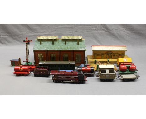 A good collection of Hornby Meccano O gauge and rolling stock and buildings to include a maroon liveried Royal Scott 6100 and