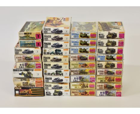 A collection of thirty five (35) Matchbox boxed 1:76 scale model tank / amoured vehicle kits, to include Sherman Firefly; Pan