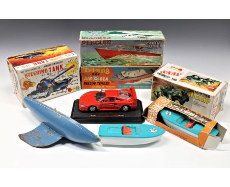 A collection of vintage toys - Marx Toys boxed remote control battery operated Steering Tank and Hill Climbing Jeep together 