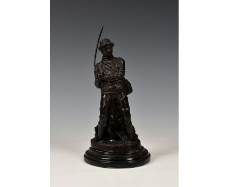 A bronze figure of a fly fisherman signed L. Earoy, standing on oval marble plinth, 8 ¾in. (22.3cm.).