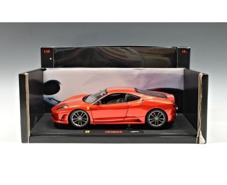 A boxed Ferrari 430 Scuderia 1-18 scale Hotwheels Elite model.