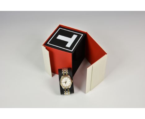 A boxed Tissot Carson Lady Automatic white dial two-tone ladies watch.