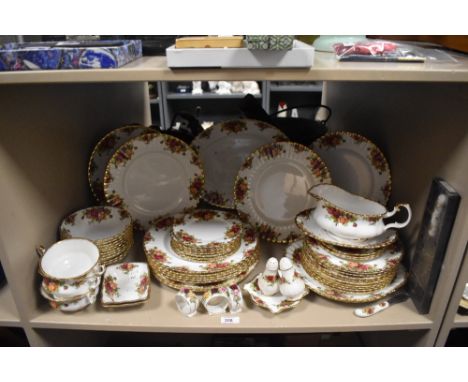 A Royal Albert 'Old Country Roses' part dinner service comprising of dinner plates, serving platters, gravy boat, salt and pe