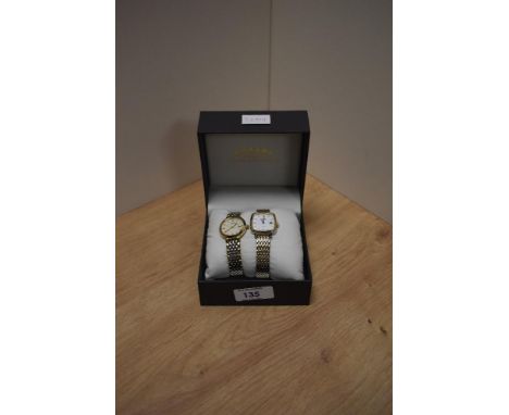 Two Rotary wristwatches in a Rotary case, one having a circular champagne pinstripe dial and baton five minute markers with a