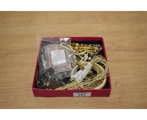 A collection of costume jewellery, including statement necklaces, beaded necklaces and a bangle etc