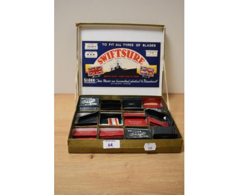 A boxed set of early 20th Century Swiftsure razor blades in leather pouches