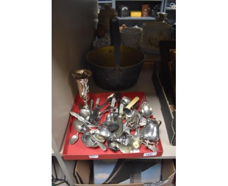 A brass jam pan and a collection of flatware and cutlery including loose tea diffuser, pickle fork, sugar tongs, a plated jug